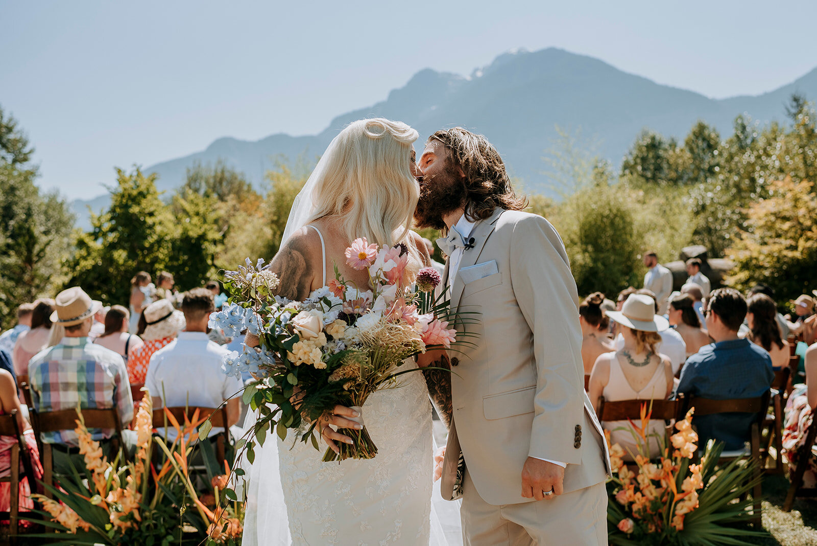 Helen and Mark lock lips after their wedding ceremony