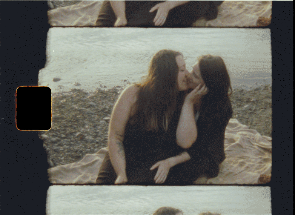 lesbian couple picnic lakeside inside of grand tetons national park