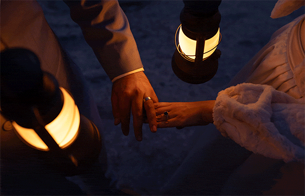 A bride and groom dance while in view of the mountains at Mammoth Lakes on their wedding day. 