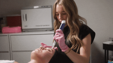 Gif of aesthetician doing a microneedling treatment