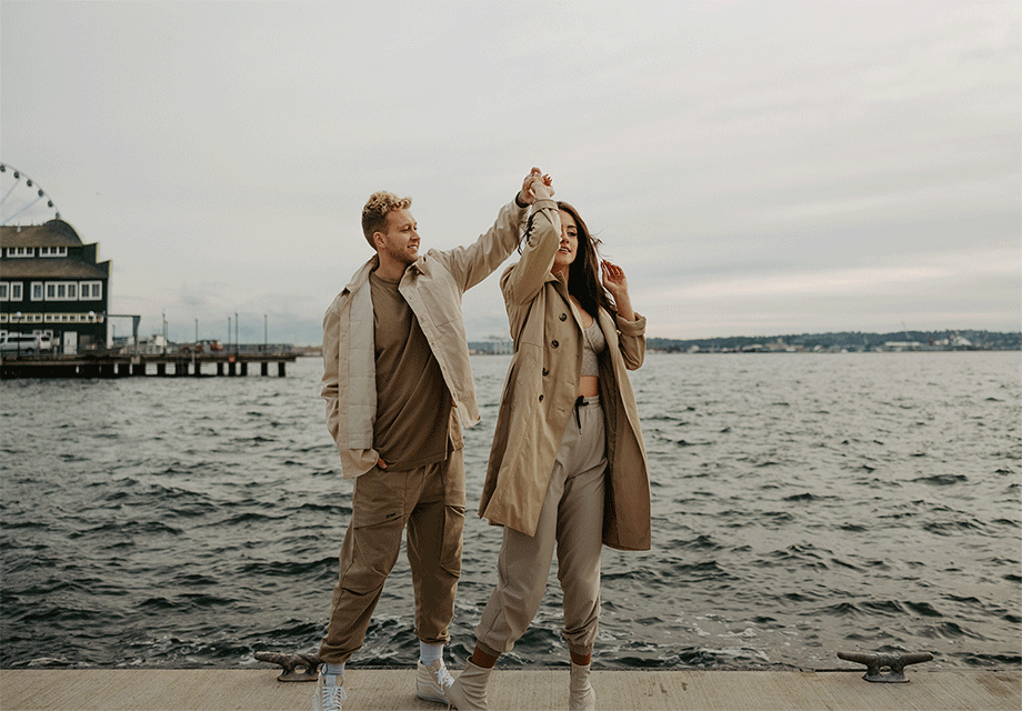 couple dancing on a pier