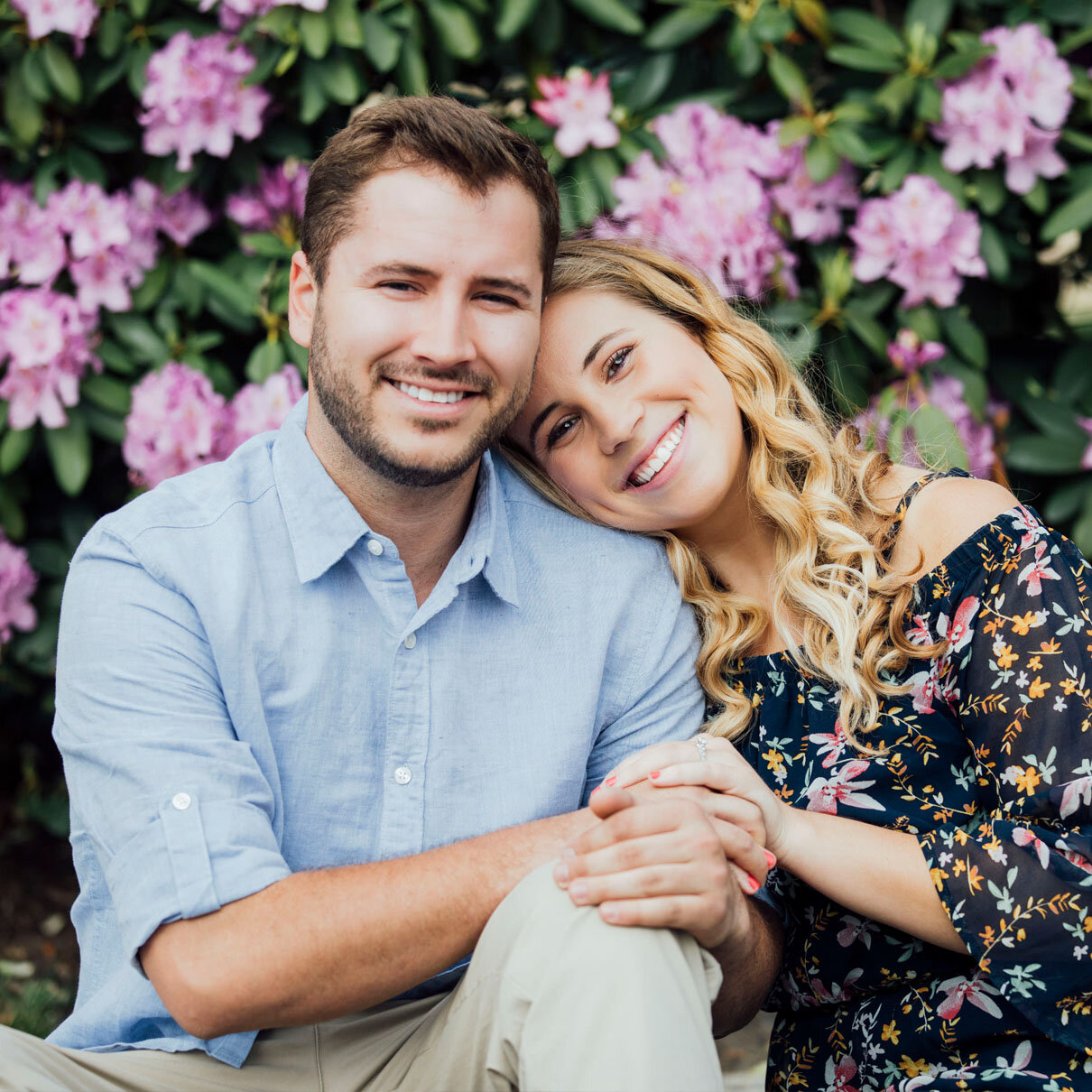 Grounds for Sculpture Engagement | Couple posing with pink flowers | Hamilton Township, Mercer County, New Jersey