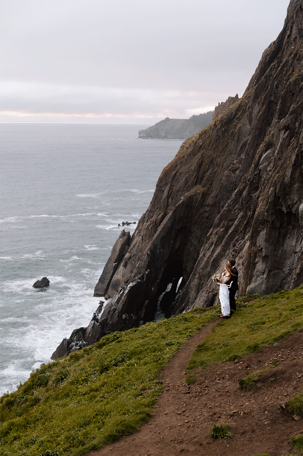 GIF of couple on a cliff edge on the Oregon Coast.