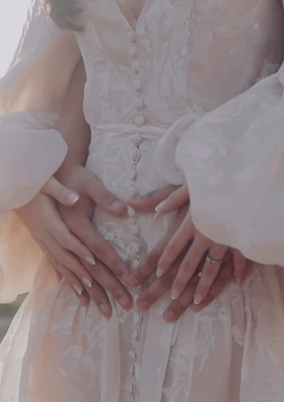 GIF of Bride and Groom Holding Hands