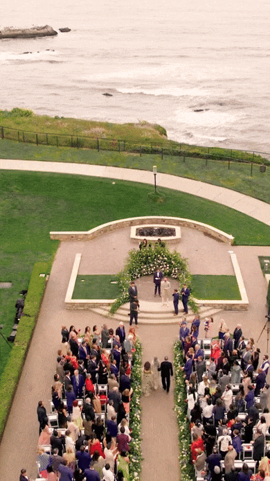 Bride and groom walk up memorial steps at their DC wedding