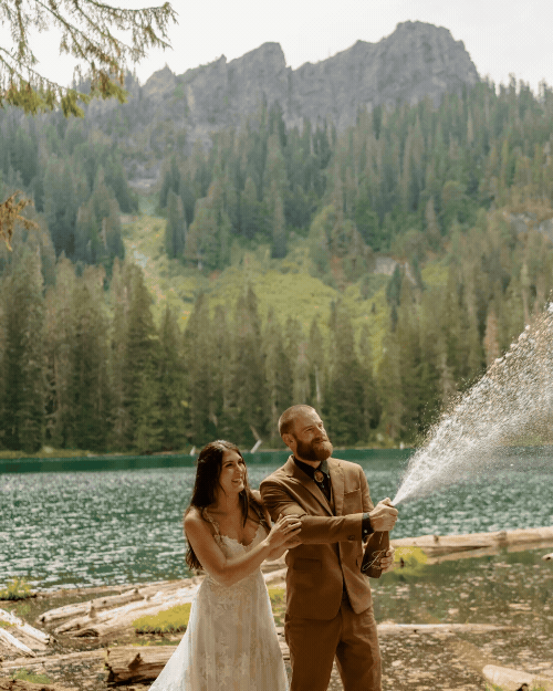 bride and groom throwing snow
