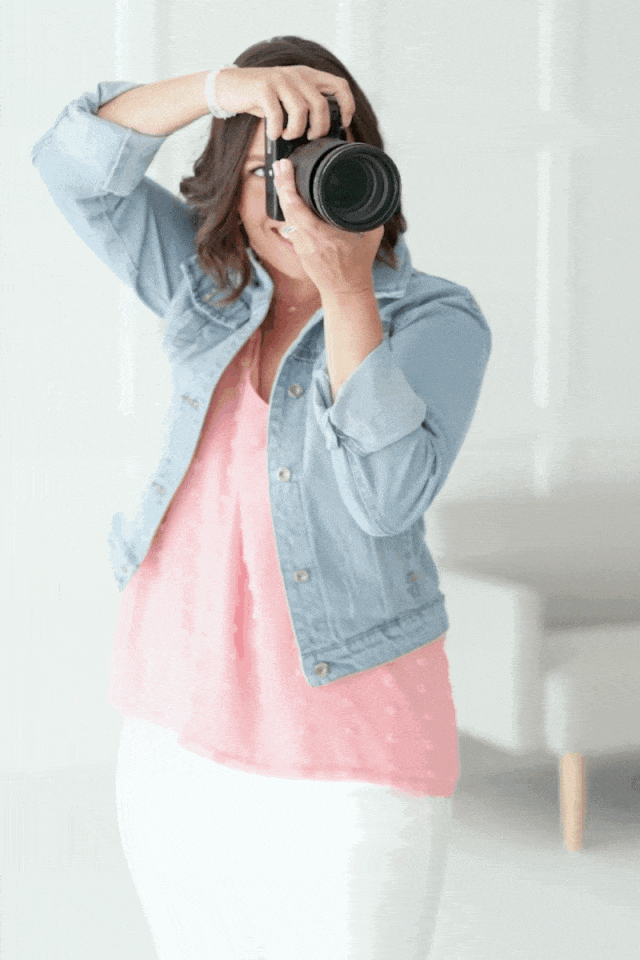 woman capturing a photo in the studio
