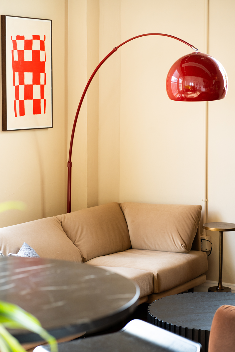 Browserbase Office — lounge with arc lamp and neutral sofa