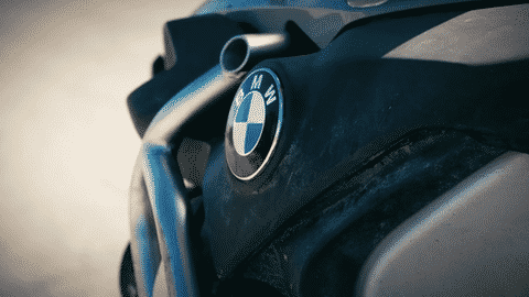 Close-up of BMW motorcycle captured during outdoor video production for motorcycle accessories marketing