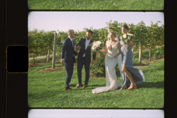 bride and the groom celebrating after their ceremony captured on super 8 film