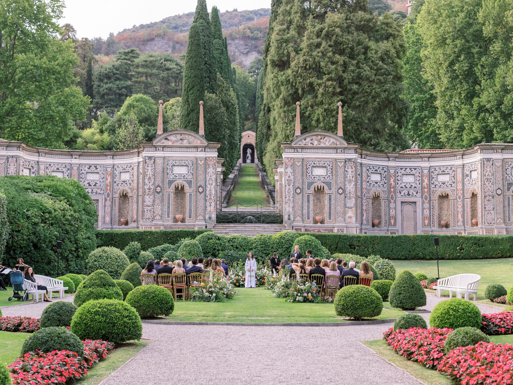 the mosaic garden of villa d'este lake como setup for a wedding