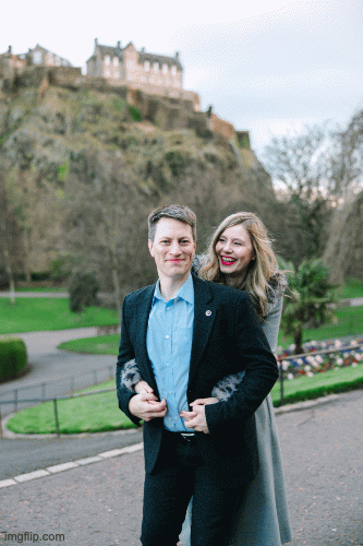 couple laughs near Edinburgh Castle