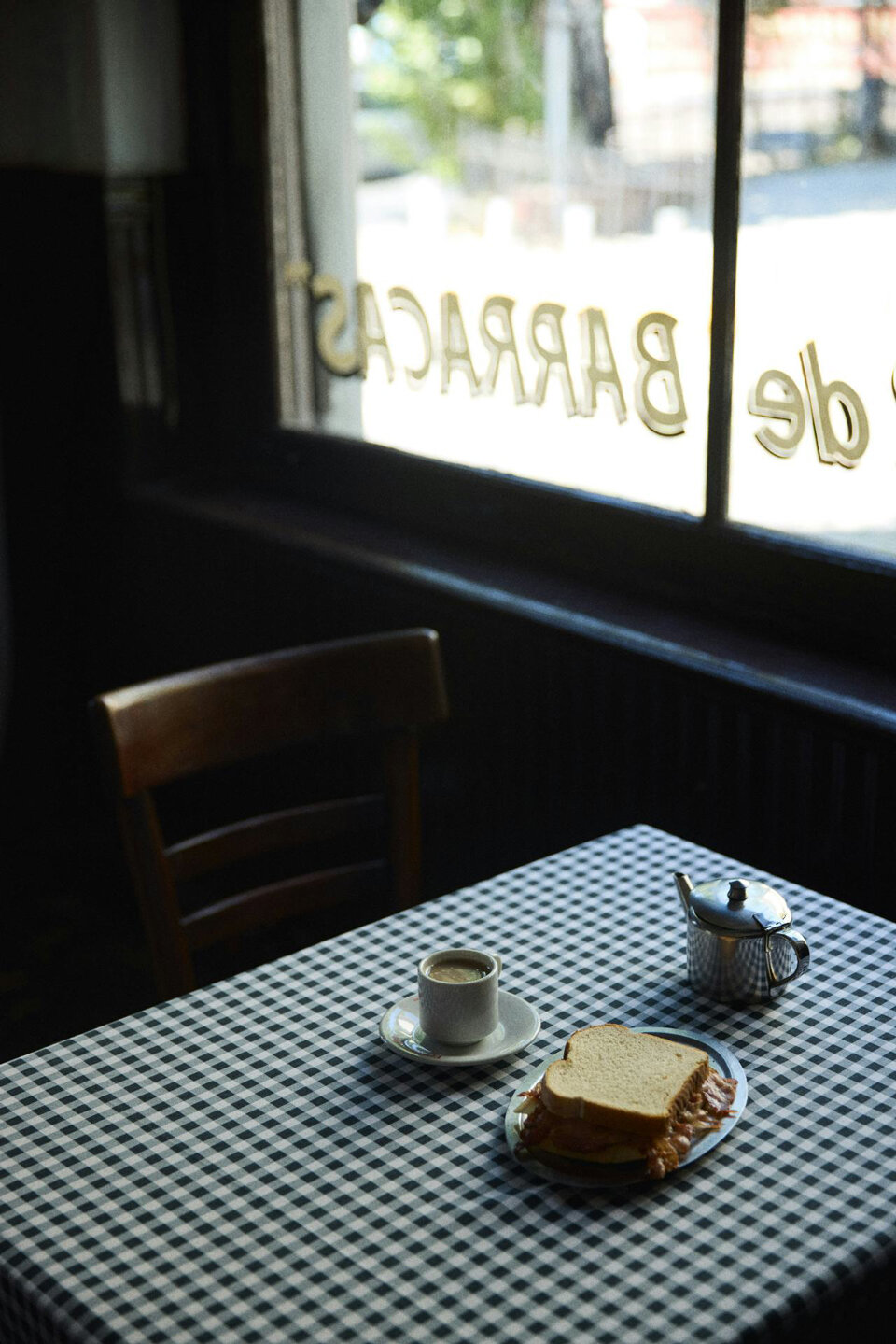 Coffee and toast on checkered table