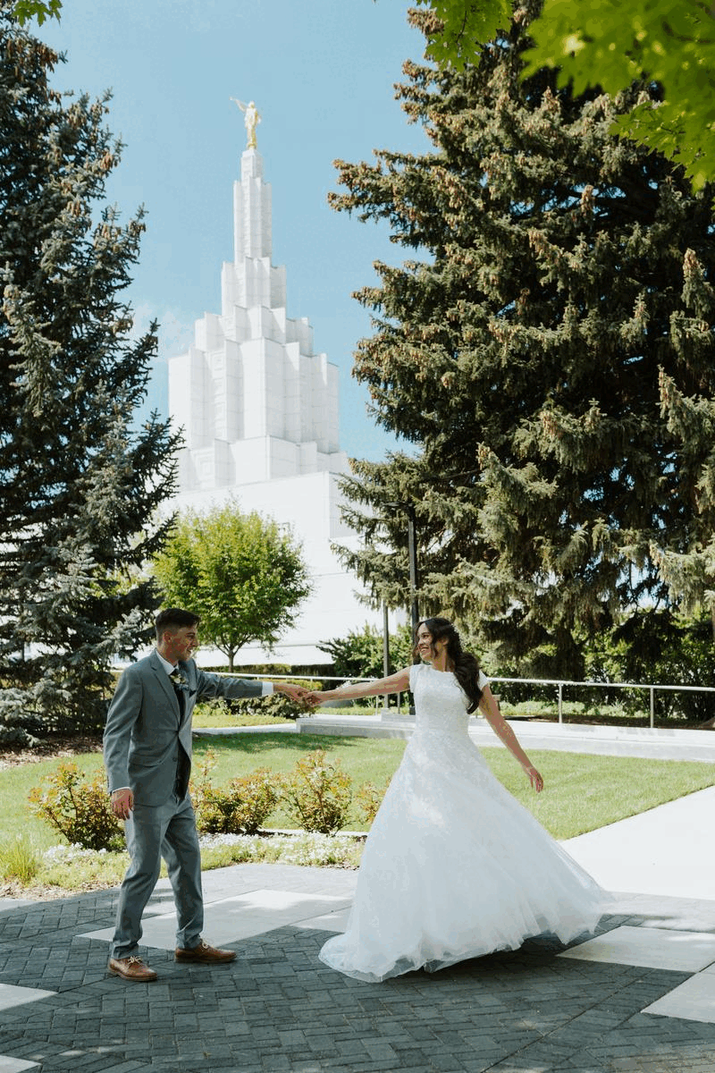 Couple dancing in front of the Temple during their Idaho wedding ceremony