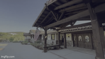 Gif of real estate video starting on the front exterior and moving into the dining and living room