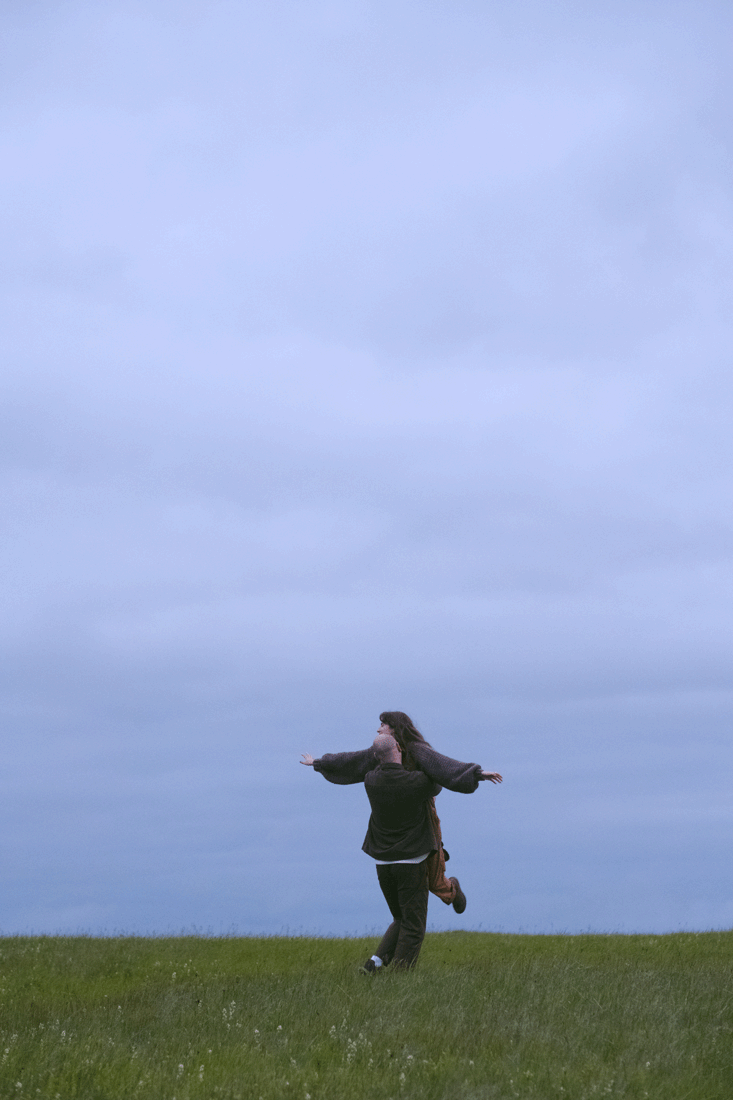 gif of couple swirling in a field - cinematic portraits Portland and PNW Photographer 