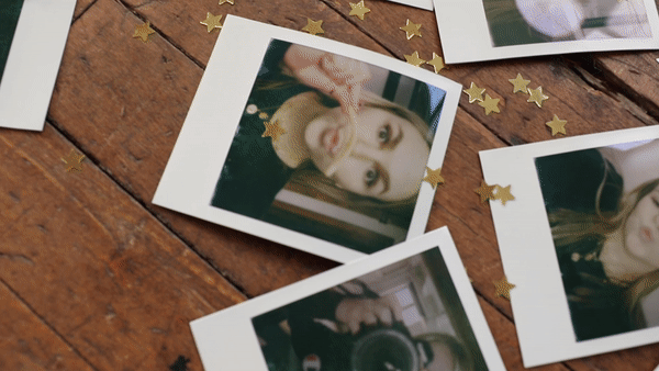 GIF of Polaroids and Glitter on ground