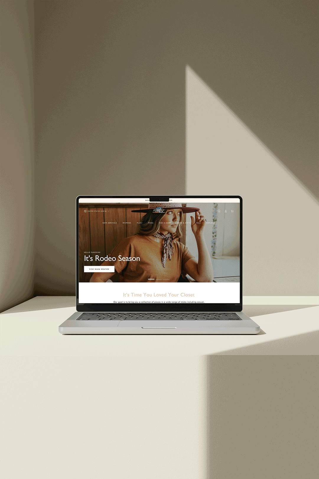 A gif of a scrolling Shopify website built for a western clothing store named Hat Creek Boutique, with a clean modern style.