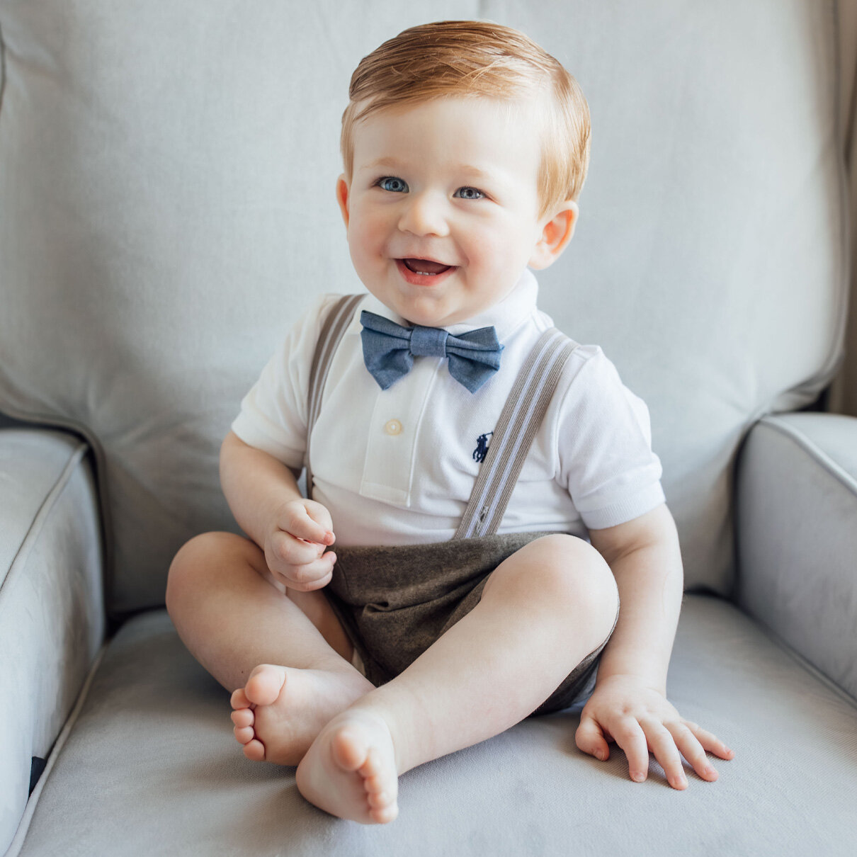 Baby boy sitting in a rocking chair | Child photographer in New Jersey