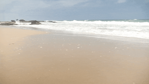 a view of a sandy beach