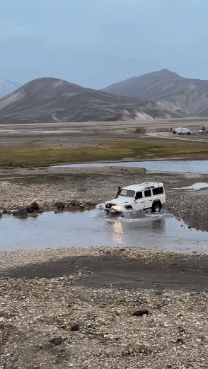 super jeep adventure elopement in the highlands crossing a river