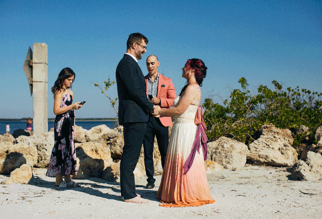 Destination Elopement Ceremony on the beach Bride and Groom kissing