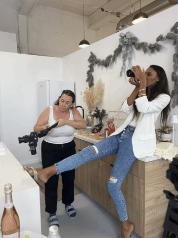 photographer in action with client