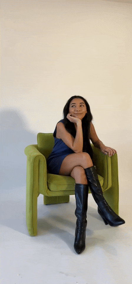 Bri, founder of One Eleven Social Studio, smiling in a content shoot.
