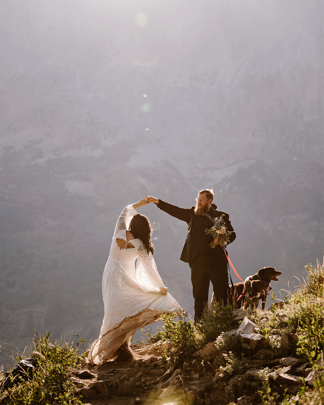 Couple hiking in the Colorado mountains on their wedding day