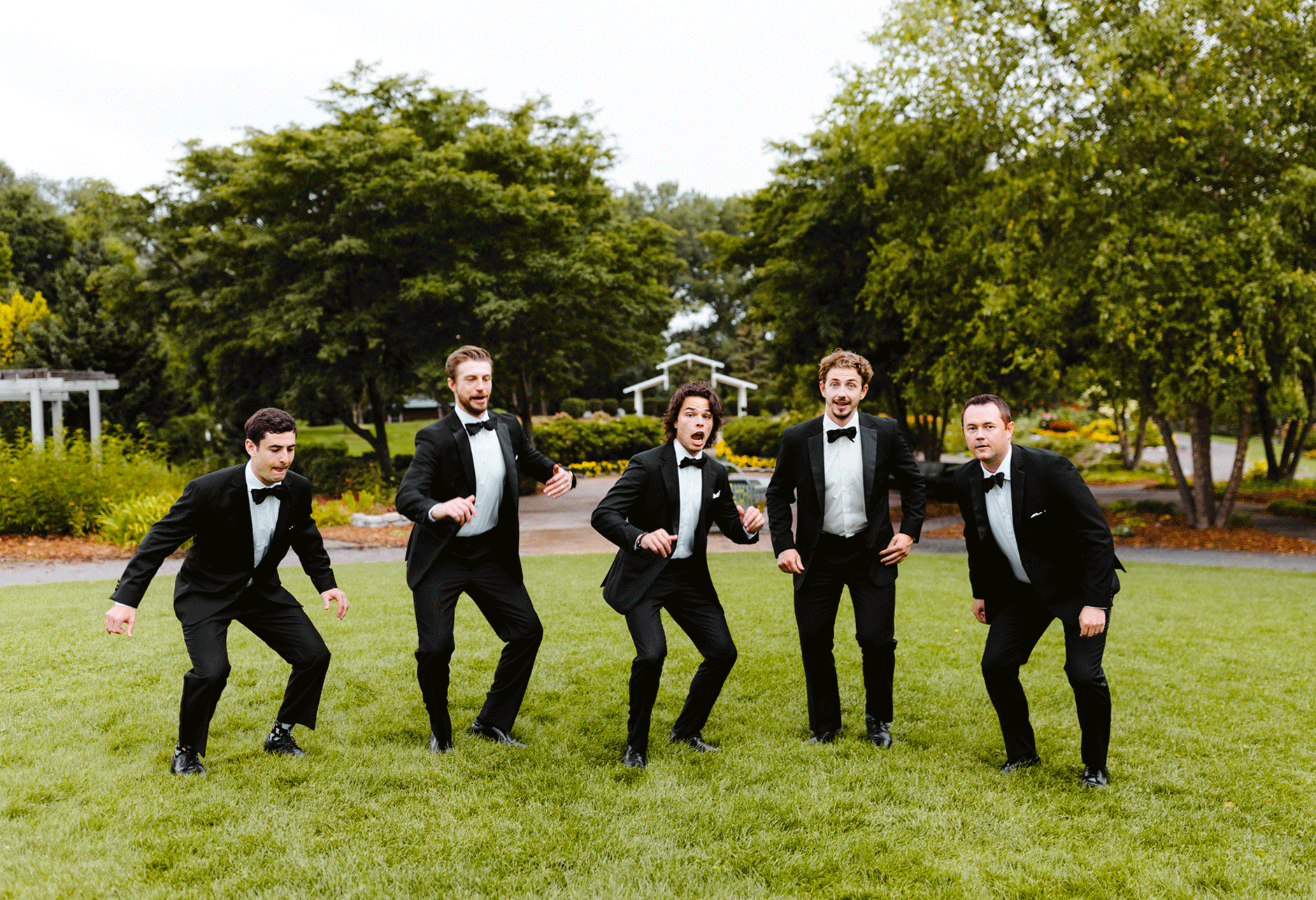 Groomsmen jumping up and down GIF