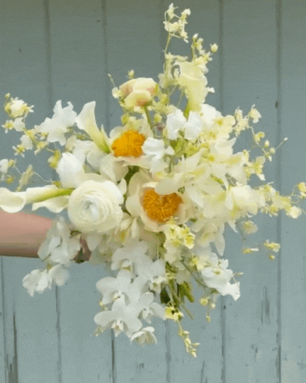 tropical white and green wedding bouquet designed by Sunrise Blooms Kauai