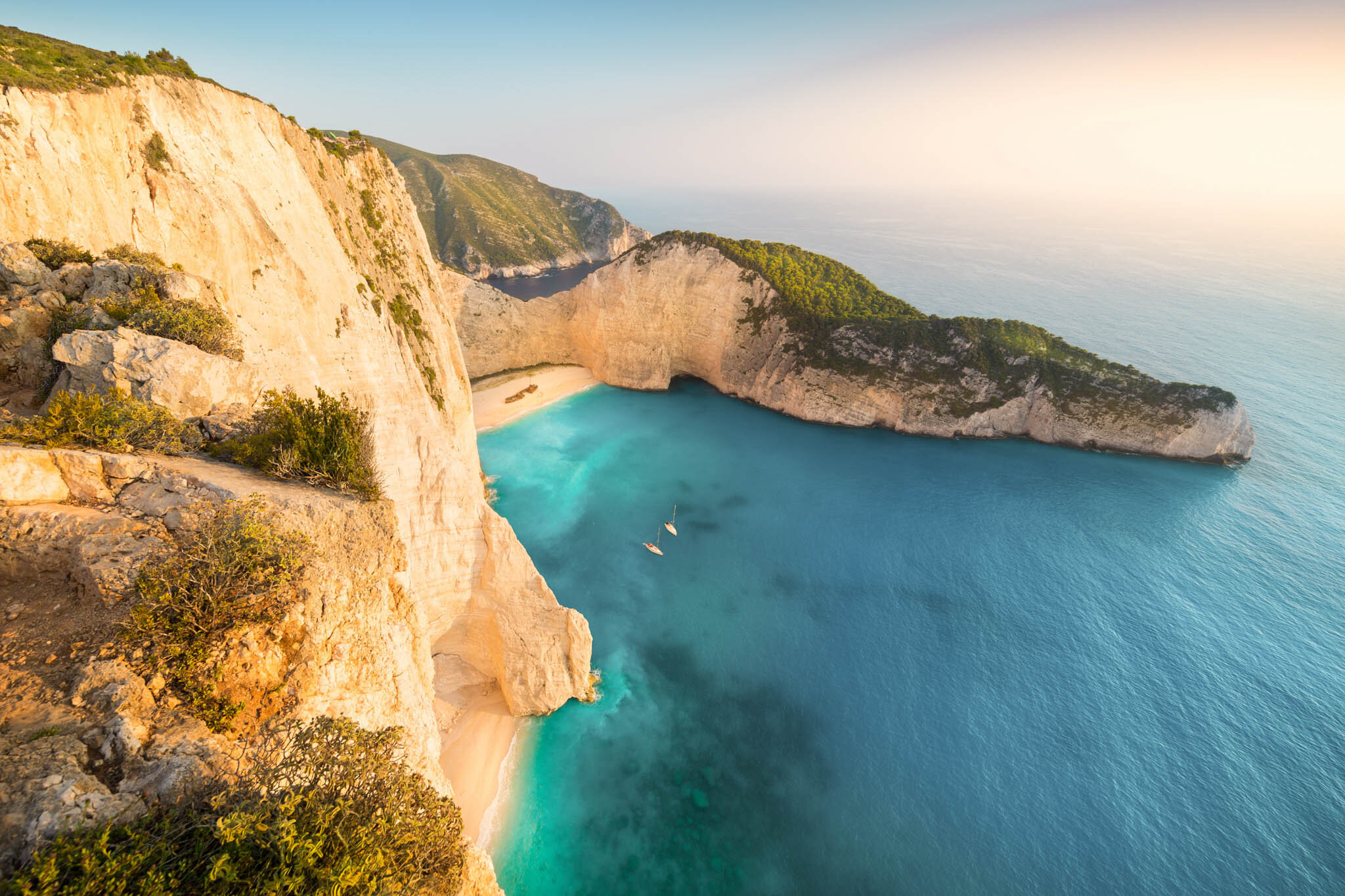 Mom with suitcase in a beautiful hotel