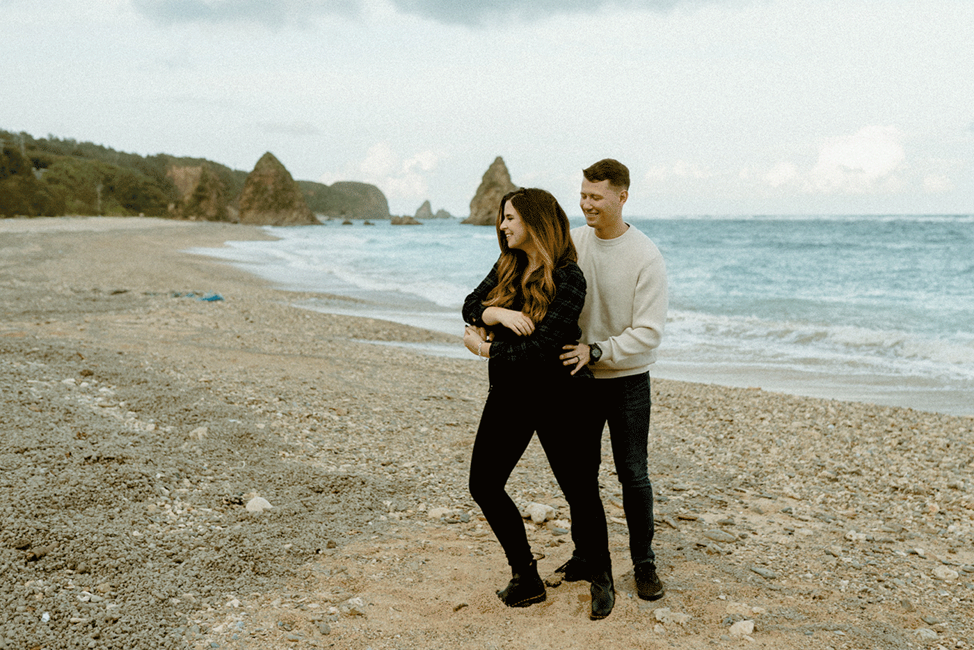 B & T spinning on the beach
