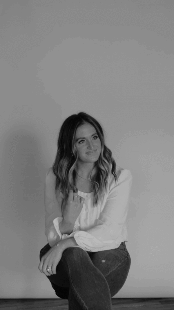 Woman sitting and smiling