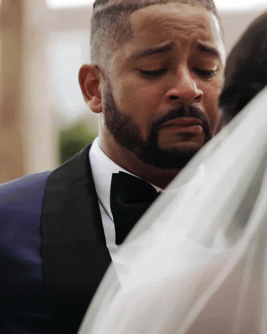 Groom crying during first look