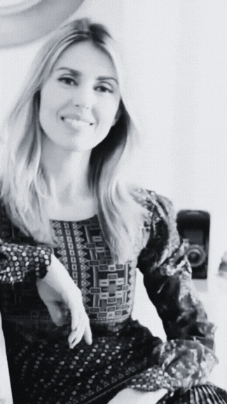 Woman posing in front of props