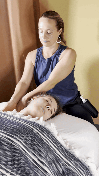 video of woman offering massage therapy  to clients neck