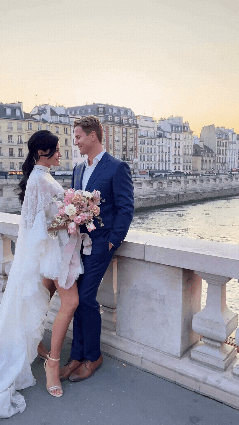 Bride and groom at the Seine in Paris, France