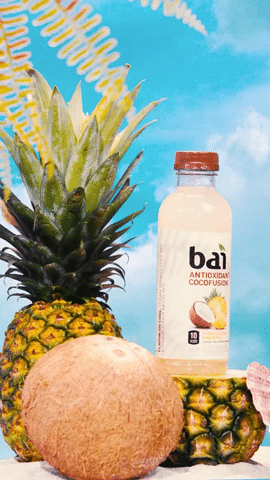 Branded product video production showcasing Bai Cocofusion drink with tropical fruit styling for marketing content