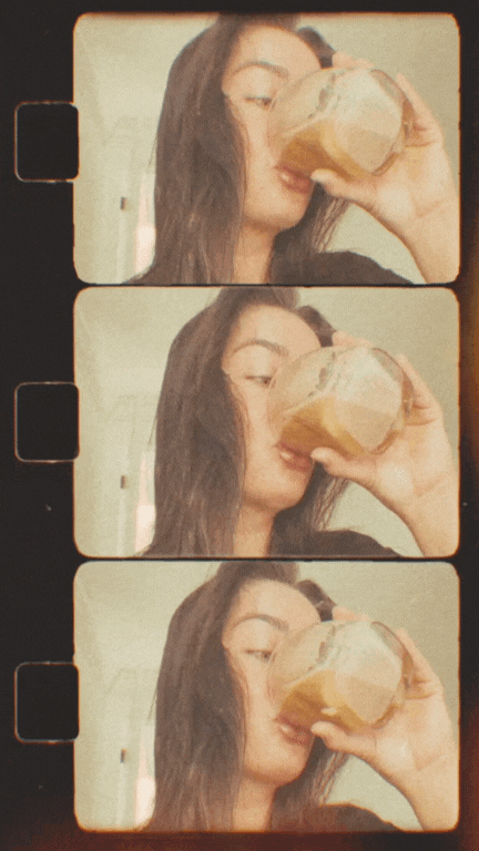 Girl drinking coffee in a looped video