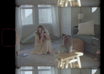 Gif of Britni Dean taking a photo of her daughter