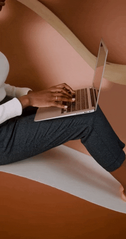 woman typing on computer gif