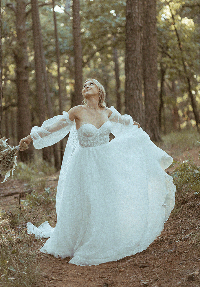 boho bride twirling her gown