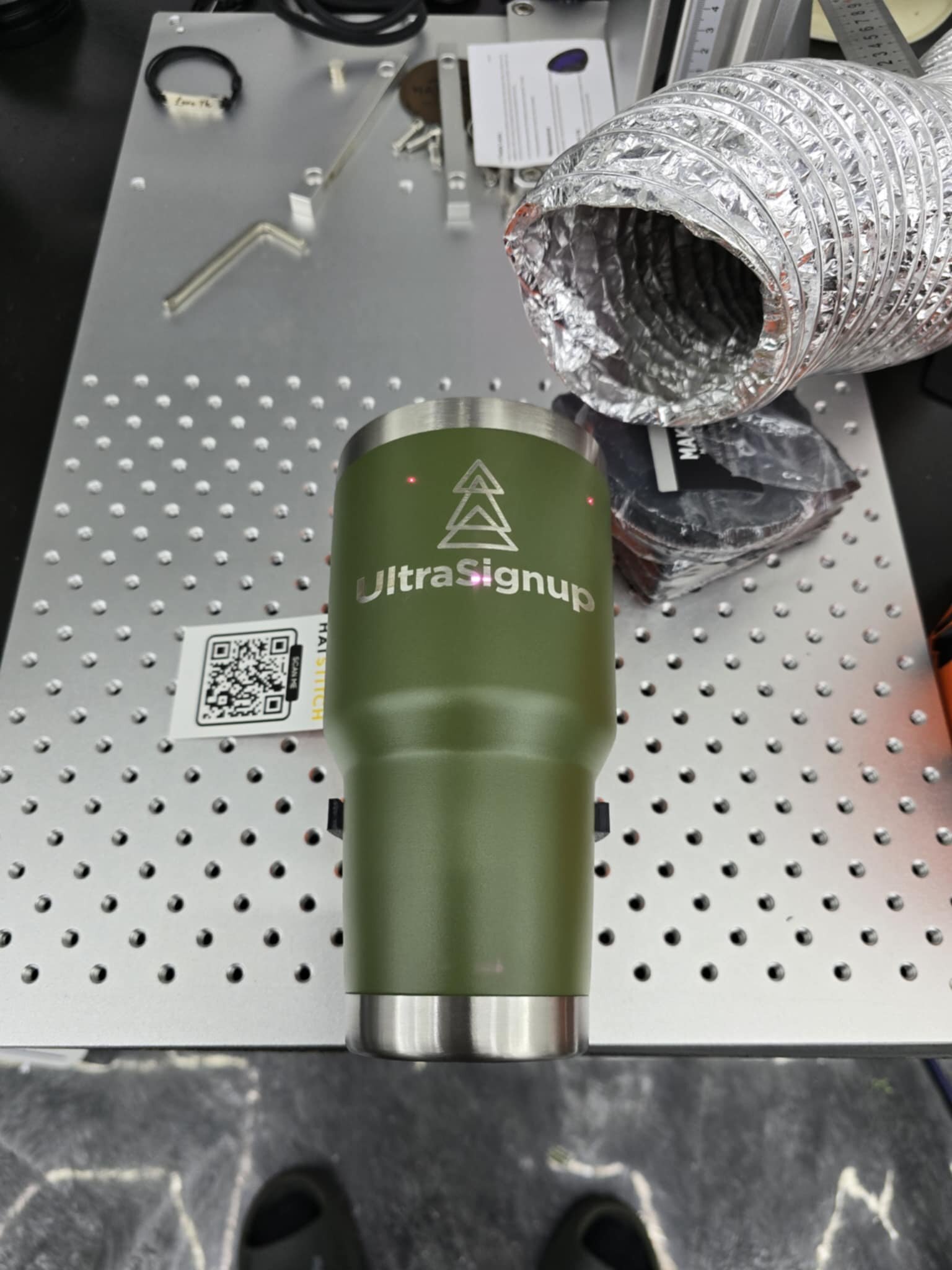 Fiber laser engraving on stainless steel tumbler at Hat Stitch Katy TX