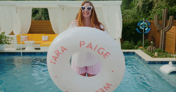gif of austin wedding photographer tara paige splashing and playing in the pool