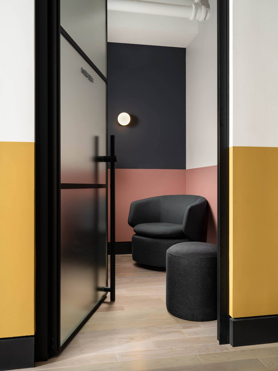 ReTool NYC Office — lounge chair and color-blocked wall