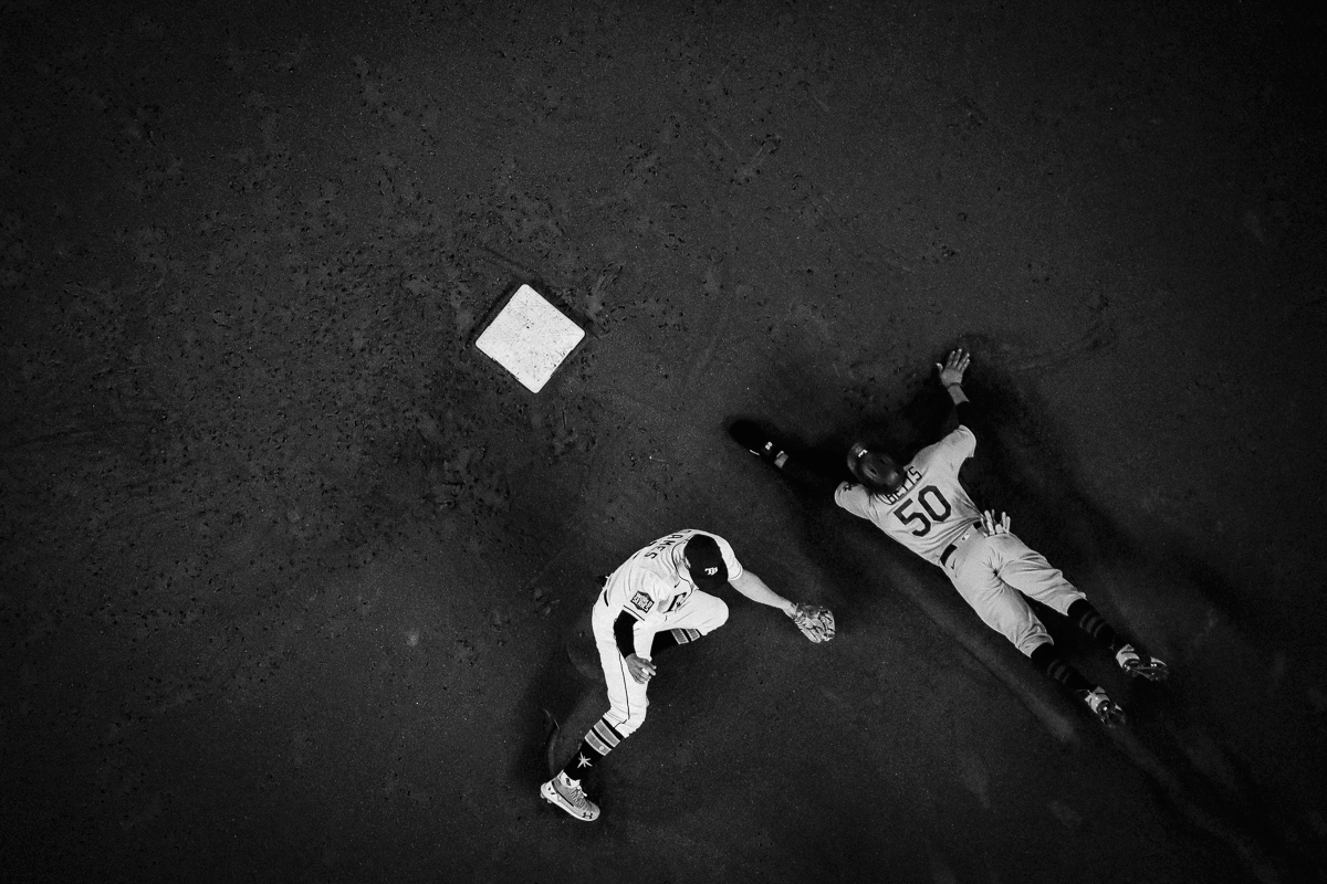 Animated GIF Aerial view Mookie Betts steals second base in the 2020 World Series as Willy Adames tries to lay down the tag