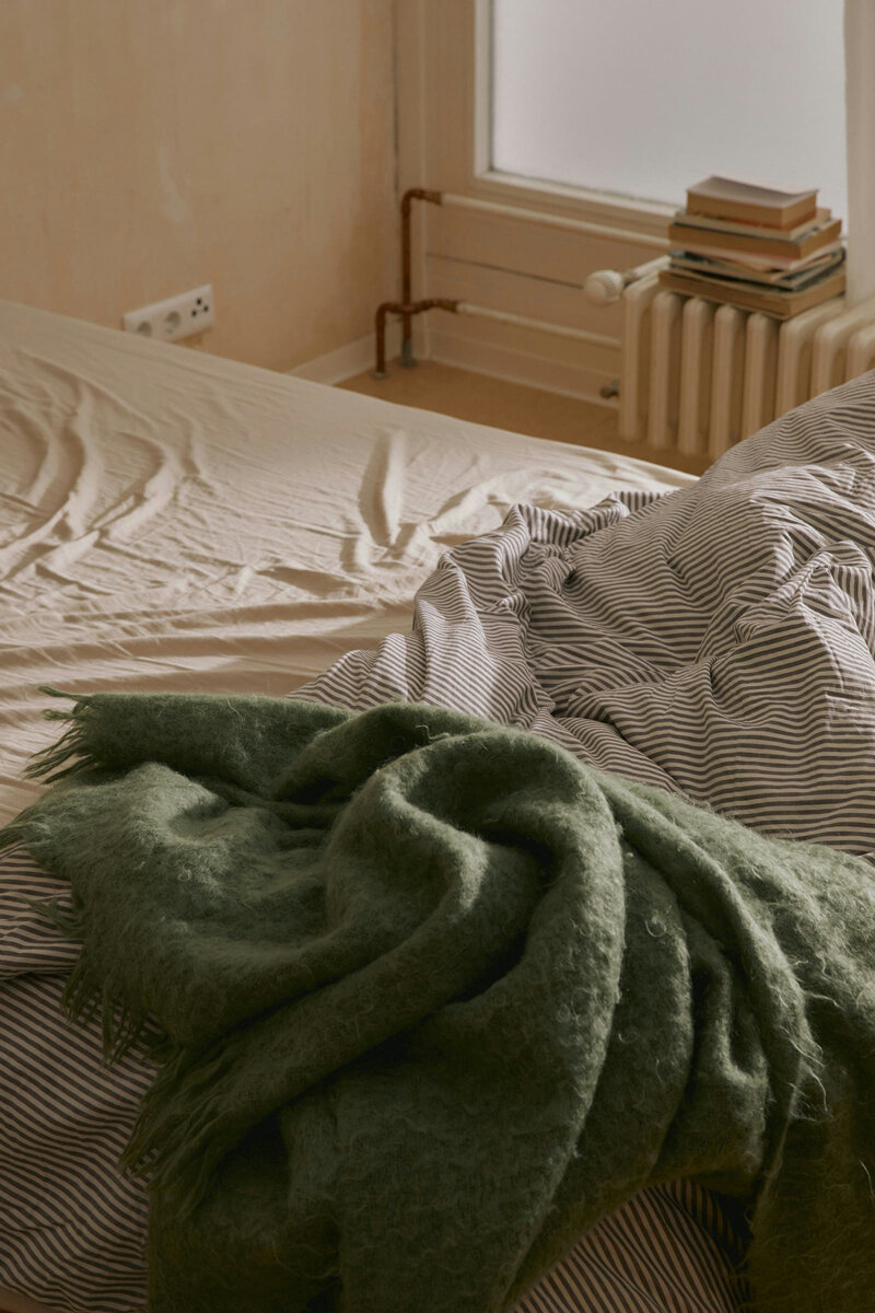 unmade bed sheets