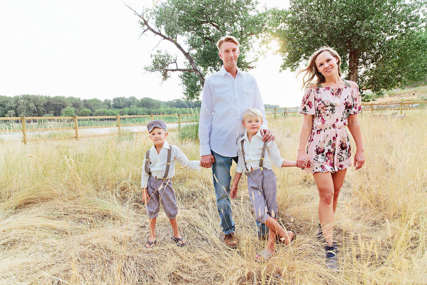 a family of four in their yard showing off their unique style