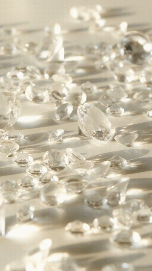 Video of diamonds strewn across a table